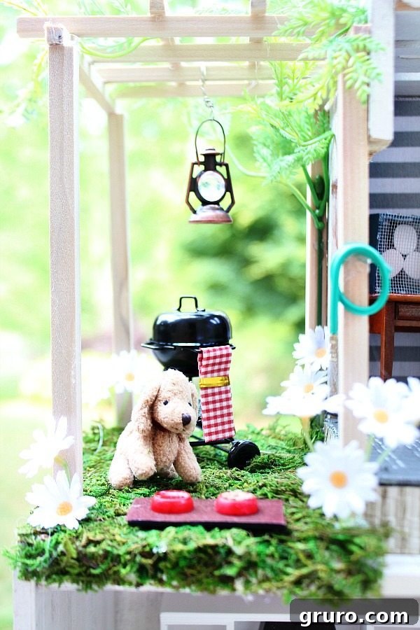 Adding a charming pergola and grass to the dollhouse patio Crate dollhouse with miniature pergola and outdoor area
