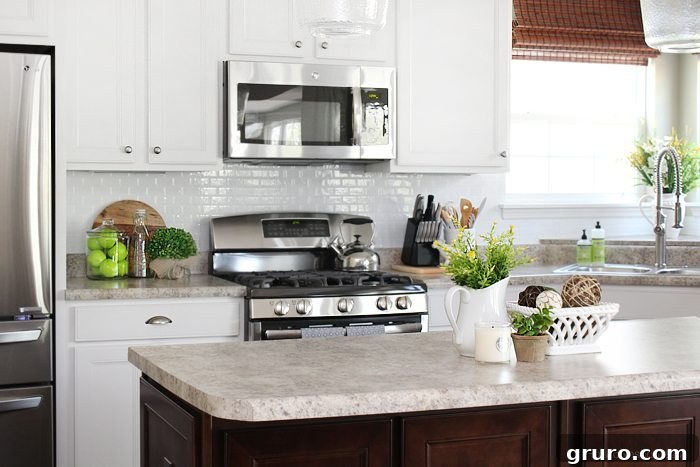 Monday Motivation: May 15 3 Stylish self-adhesive kitchen backsplash in white smart tiles, a DIY home improvement project for a modern kitchen look.