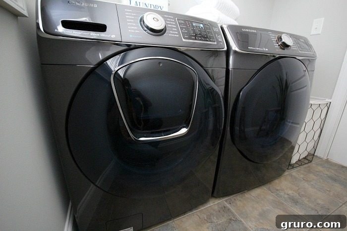 Professionally installed Samsung AddWash Washer and Dryer in a newly renovated laundry space