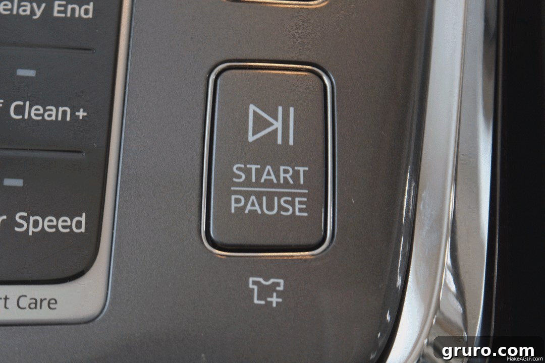 A close-up view of the innovative Samsung AddWash feature on the front-load washer