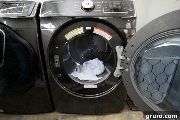Samsung Black Stainless Steel Steam Dryer, a key appliance in the modern laundry room makeover