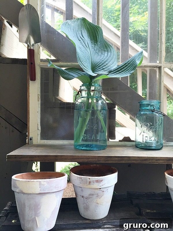 Upcycled Windows for Charming Garden Decor 8 Blue mason jars - Repurposed Window is now a Garden Shelf - easy power tool challenge perfect for the patio at Refresh Restyle