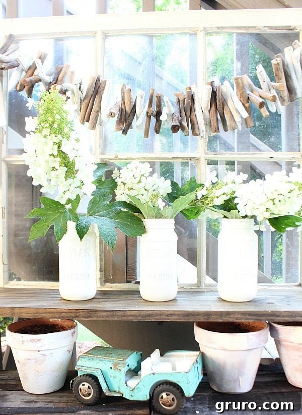 Faux Milk Glass Projects 10 Close-up of a DIY milk glass jar accenting an outdoor decor setup