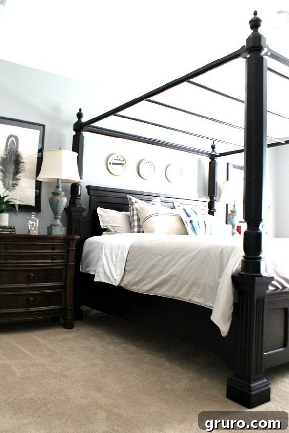 Master bedroom at RefreshRestyle.com, styled with soft grays and natural light