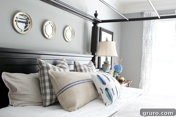 Feathers and plaids master bedroom tour at refreshrestyle.com, showcasing textiles