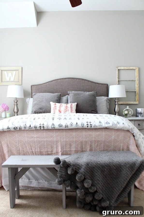 Guest room with corals and gray at refreshrestyle.com, showcasing a cozy bed
