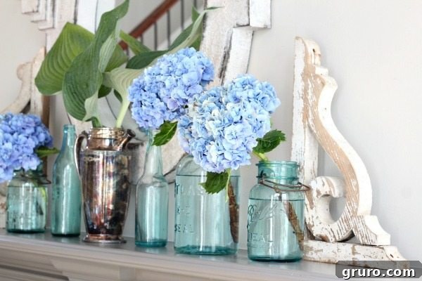 Simple mantel idea - perfect for summer with hydrangeas and hosta leaves