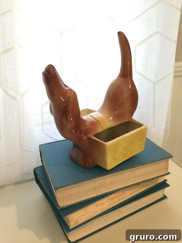 Vintage dachshund figurine, originally a change and wallet holder, repainted with Valspar Milk Glass