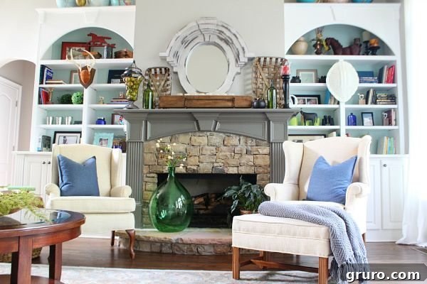 Smart Decorating 11 Dual-bookcases-surrounding-a-stone-fireplace-styling-tips-at-refreshrestyle.com_