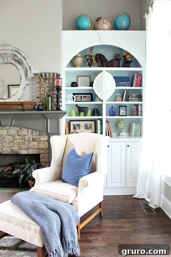 Smart Decorating 12 Globes-horses-books-styling-tips-for-bookcases-at-refreshrestyle.com_
