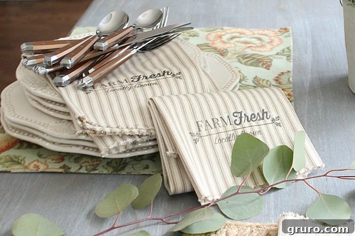 Farmhouse napkins: Free printable design enhances your DIY fabric creations. Setting a beautiful farmhouse table with homemade 'Farm Fresh' napkins created from one yard of fabric and a free printable.