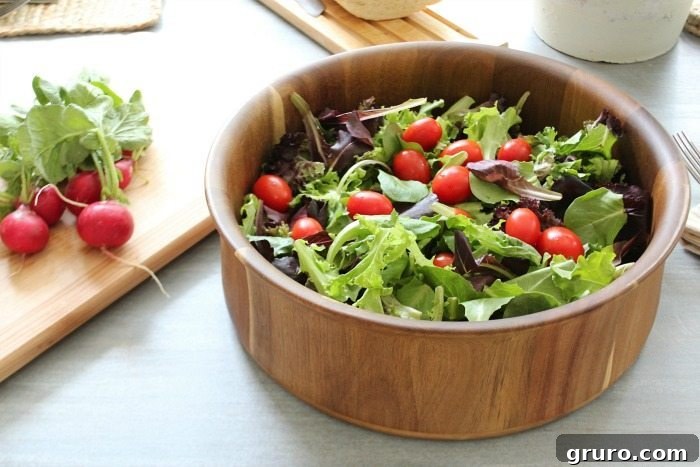 Natural wood salad bowl from Better Homes and Gardens at Walmart Natural wood salad bowl from Better Homes and Gardens at Walmart, showcasing its rustic appeal
