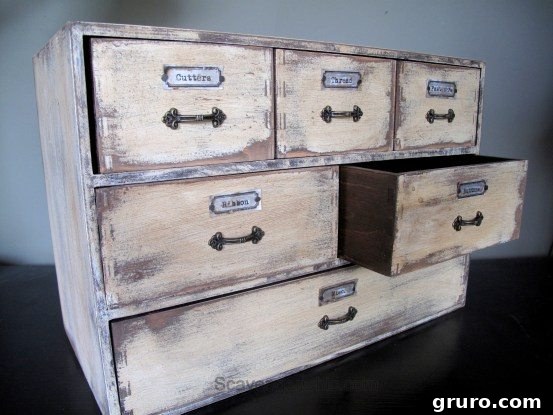 IKEA Moppe cabinet customized with vintage soda can labels for unique storage