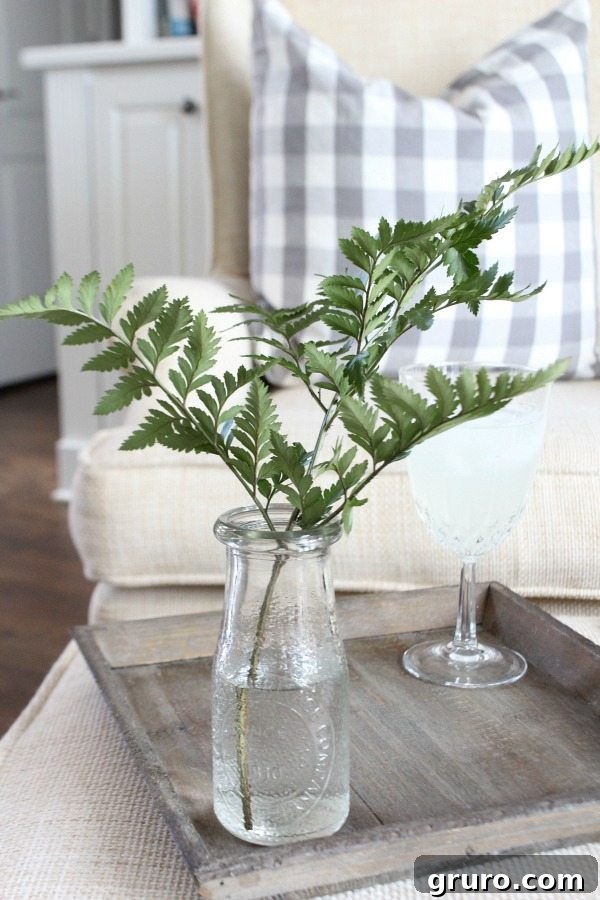 Affordable dollar store jars transformed into stylish vintage-inspired vases for home decor