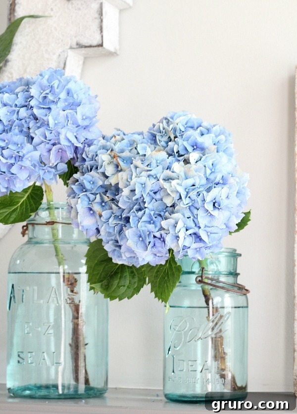 Affordable aqua mason jars found at antique stores, perfect for various home decor uses