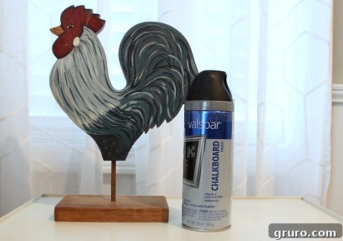 Close-up of a chicken figure painted with chalkboard paint, ready for messages