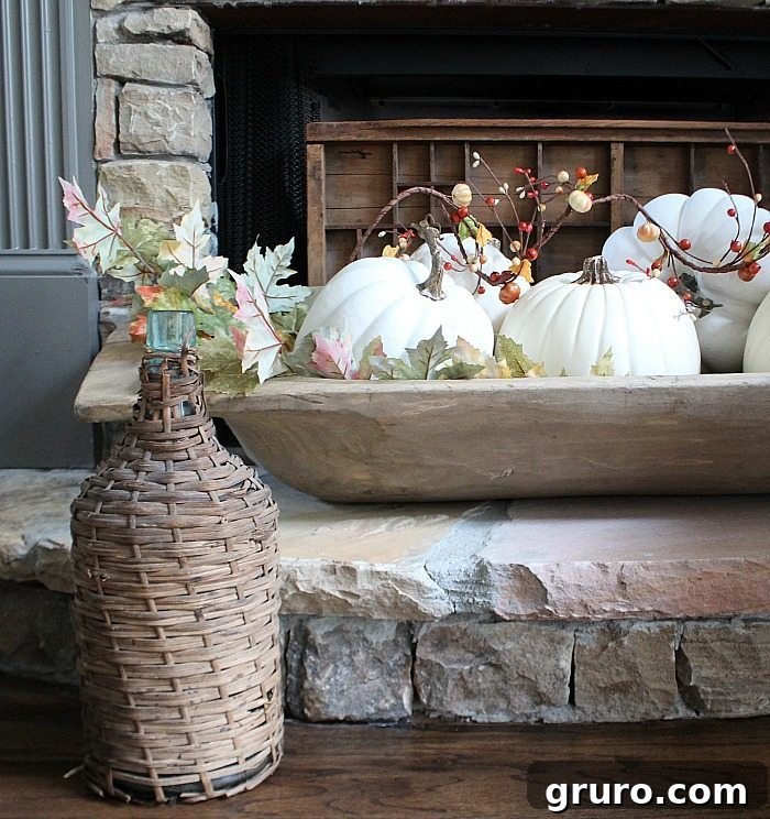 Cozy Fall Decor on a Budget 11 dough-bowl-filled-with-white-fall-pumpkins-at-refresh-restyle