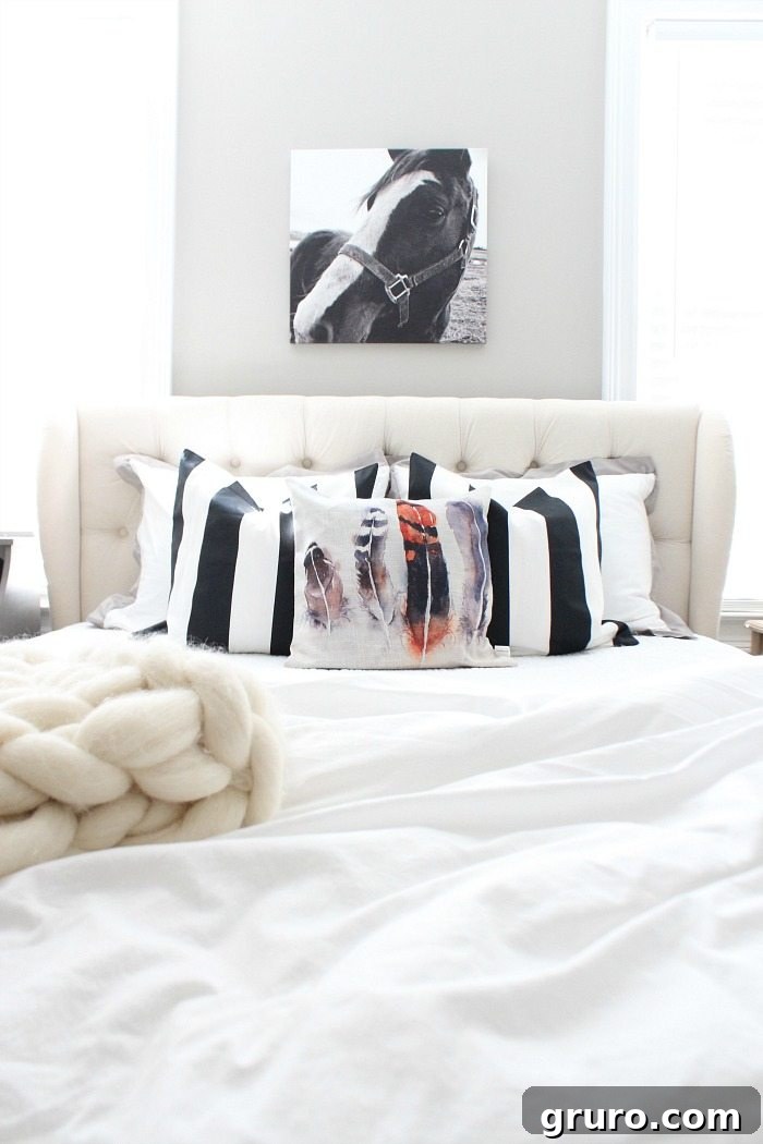 Cozy Fall Decor on a Budget 21 neutral-bedroom-with-feather-pillows-and-great-horse-print-at-refresh-restyle