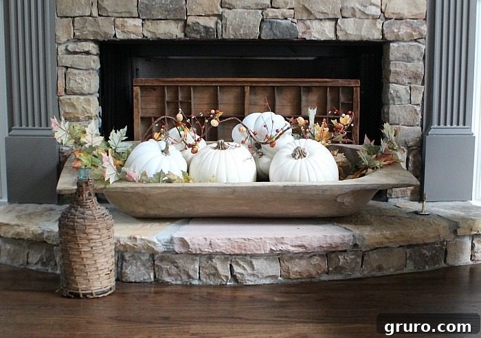 Cozy Fall Decor on a Budget 10 rustic-farmhouse-dough-bowl-filled-with-white-pumpkins-neutral-fall-home-tour-at-refresh-restyle