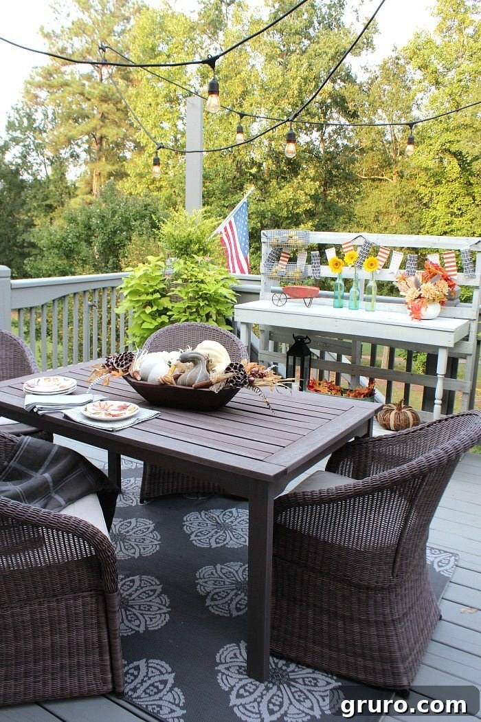 Autumn Porch Perfection 2 deck-with-lights-and-fun-fall-decor