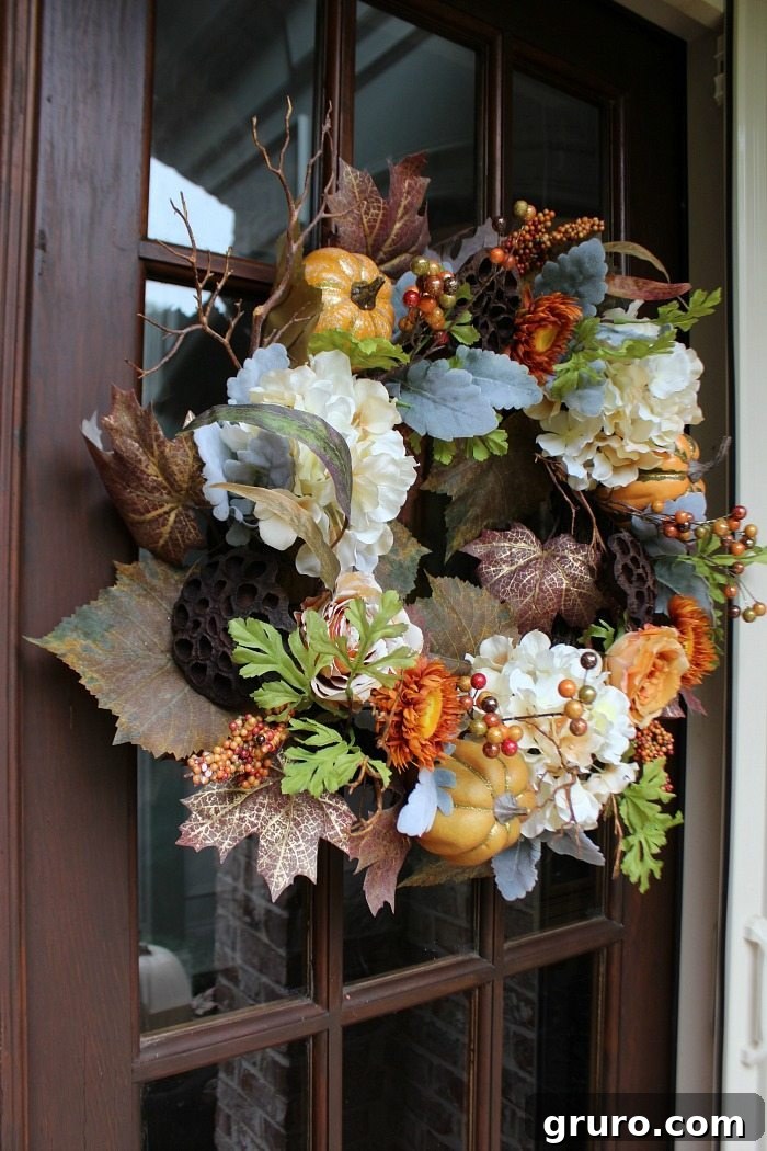 love-the-full-look-of-this-fall-wreath-filled-with-hydrangeas-seed-pods-pumpkins-and-more love-the-full-look-of-this-fall-wreath-filled-with-hydrangeas-seed-pods-pumpkins-and-more