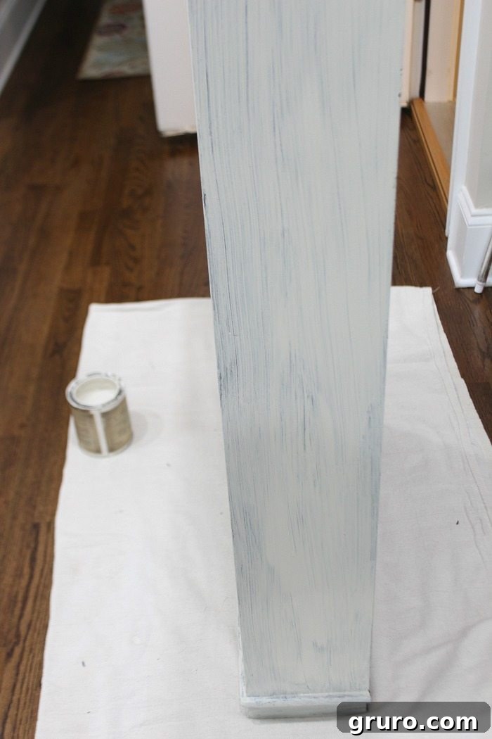First Coat of Paint Applied on the Apothecary Makeover Project