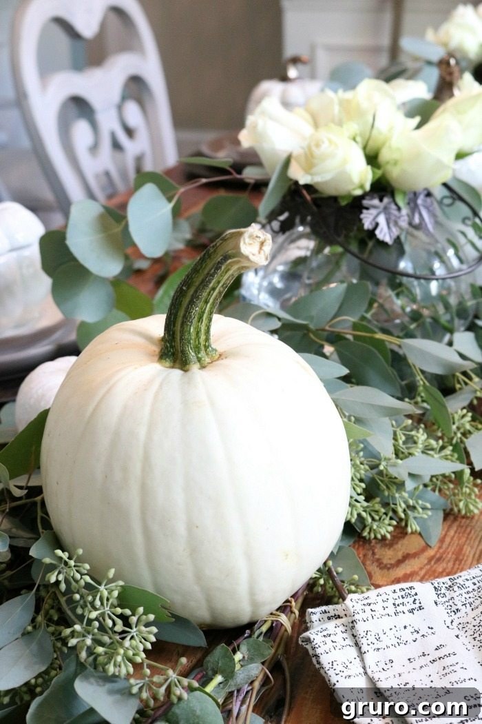 Farmhouse Autumn Gathering Table 7 Close-up of white pumpkins used for fall dining table decor at Refresh Restyle