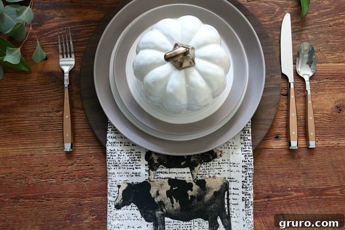 Farmhouse Autumn Gathering Table 10 Farmhouse inspired table setting with copper silverware and charming little white pumpkin bowls
