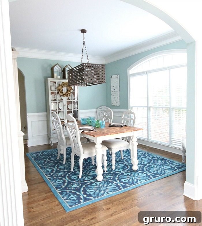 love the blues mixed with light painted furniture
