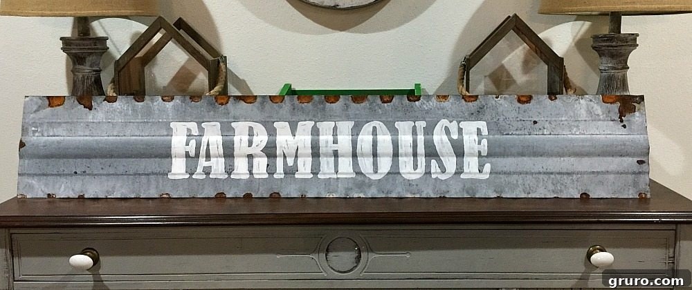Crafting a Rustic Retreat: Decorating Ideas 5 Farmhouse metal sign hand painted on the top of chicken feeder