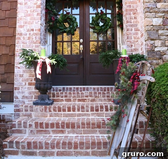 Rustic Christmas Porch: Farmhouse Look with an Old Sled and Plaid Ribbons rustic-farmhouse-ideas-for-the-front-entry