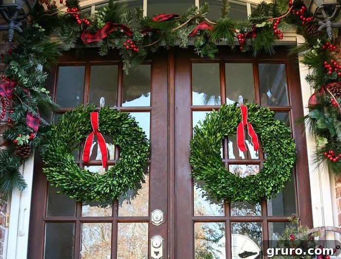Sparkling Holiday Inspiration 3 beautiful-preserved-boxwood-wreaths-with-simple-red-ribbons