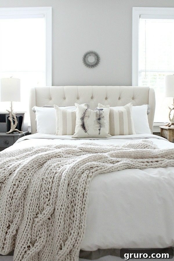 10 Timeless Farmhouse Decor Ideas 4 Beautiful guest room with neutral colors at refreshrestyle.com, showcasing farmhouse comfort