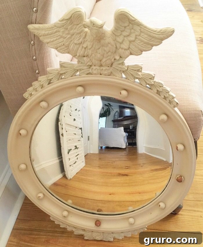 Thrifty Federal Convex Mirror - before makeover, showcasing its original dull paint and classic shape ready for a DIY update.