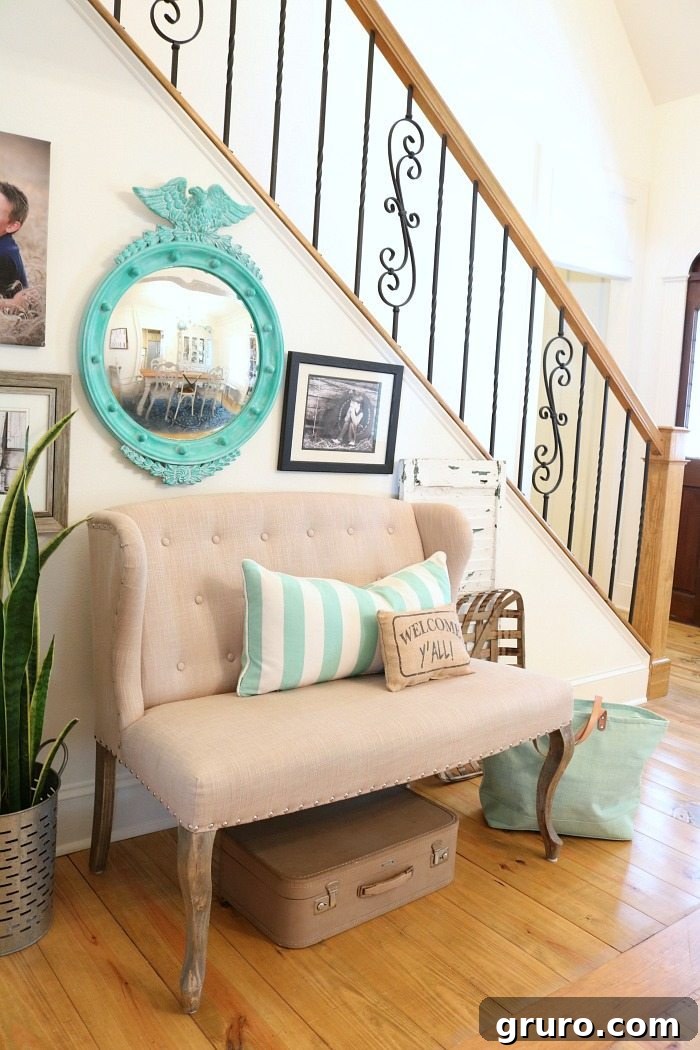 Cotton State Farmhouse 23 Loving the aqua and turquoise convex mirror in the newly painted bright entry