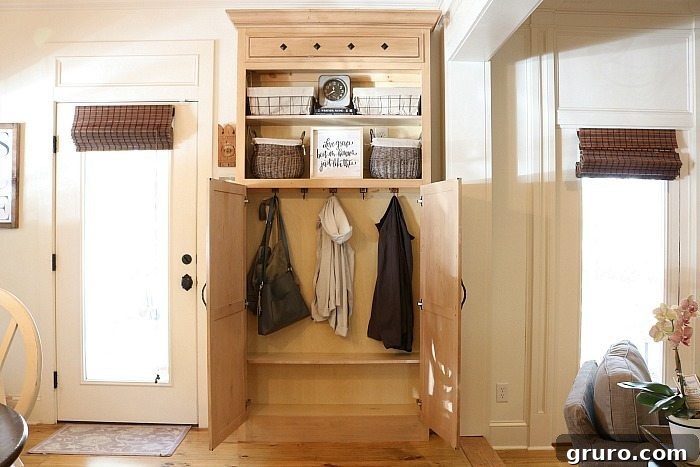 Smart Mudroom Storage 16 A charming view of the back door mudroom closet, showcasing its new role as a stylish drop zone