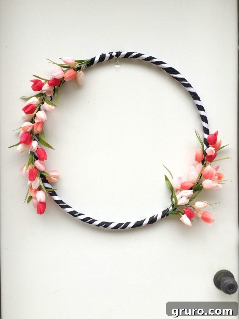 Vibrant Hula Hoop Spring Wreath 11 Hula Hoop spring wreath with black and white ribbon