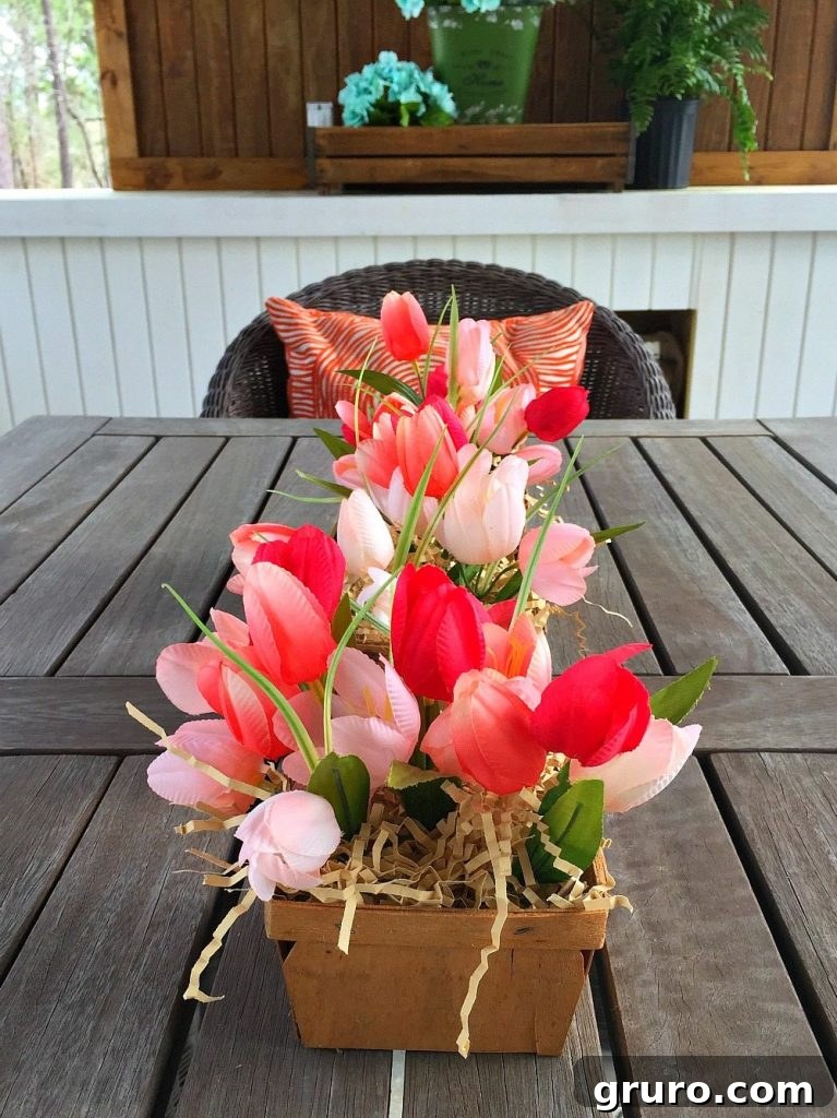 Spring tulips make a great farmhouse table centerpiece with berry baskets