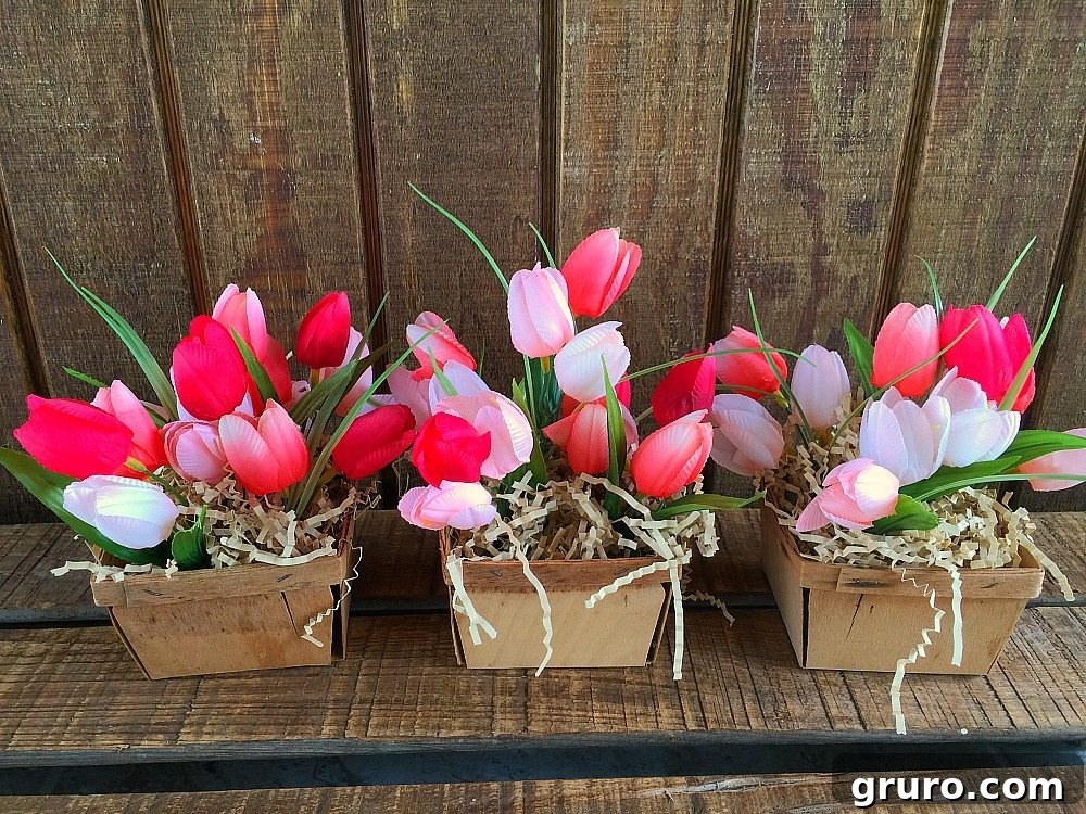 Three berry baskets elegantly filled with spring tulips