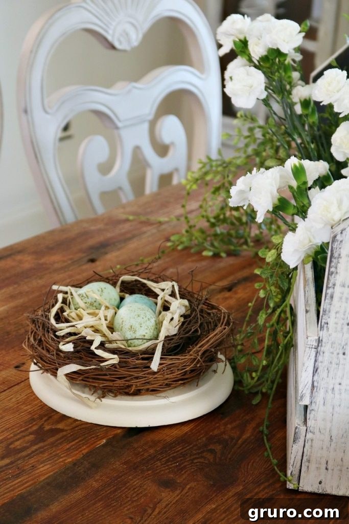 Delicate nests with speckled eggs are perfect natural accents for enchanting spring tablescapes.