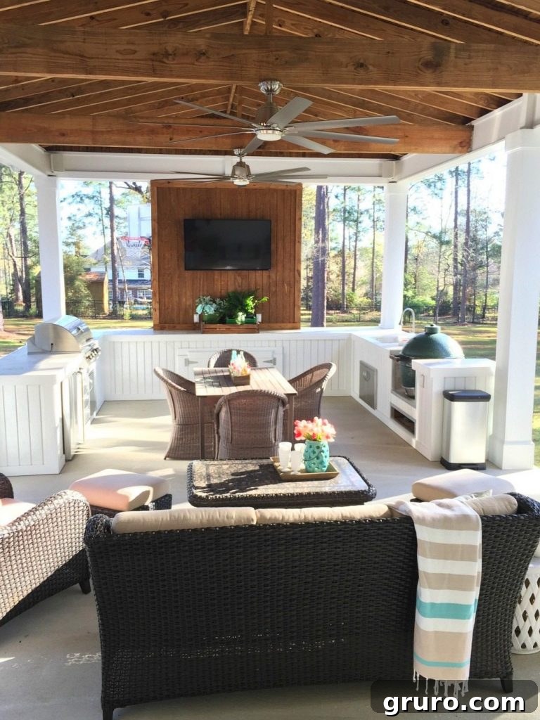 Stylish ceiling fans enhance comfort and aesthetics on the beautifully decorated farmhouse porch.