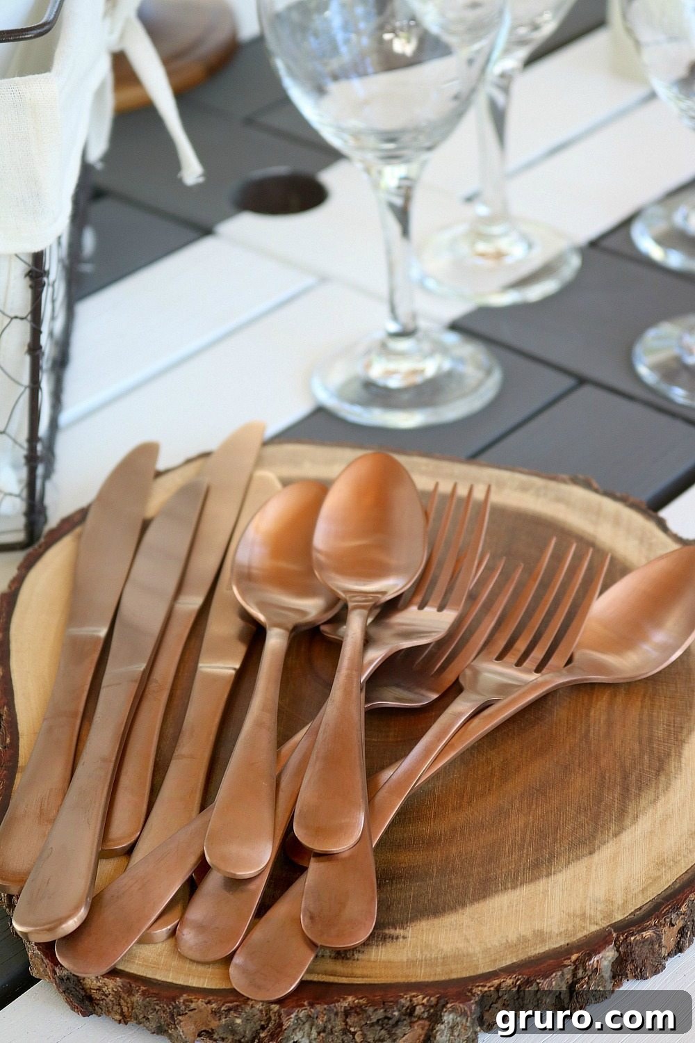 Streamlined Style, Supreme Outdoor Comfort 7 Copper tone flatware from Better Homes and Gardens at Walmart, complementing the dinnerware.