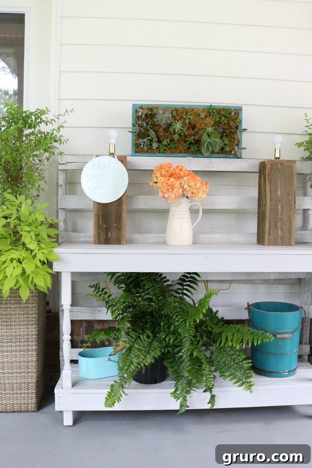 Pallet potting table featuring a vertical succulent garden, perfect for outdoor entertaining