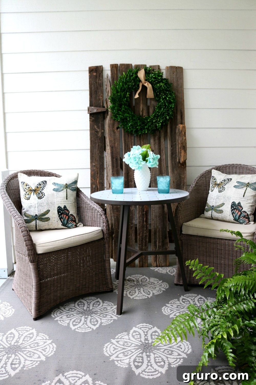 Small bistro table set for relaxing on the porch, perfect for intimate moments