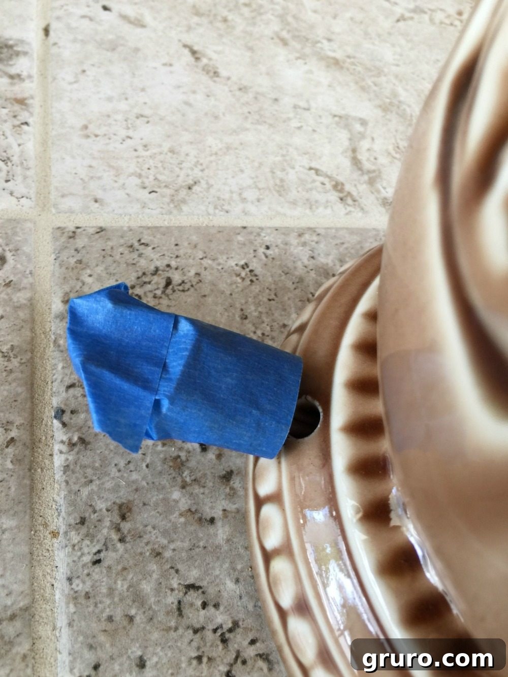 Cover the lamp cord before painting for a clean finish