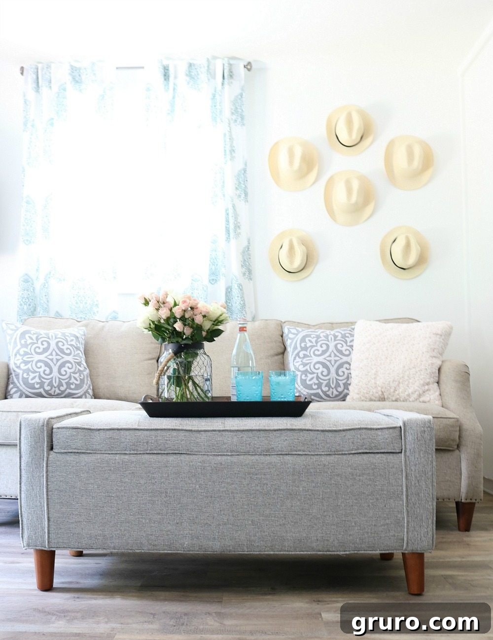 Inviting living room of the farmhouse cottage at Refresh Restyle, showcasing cozy decor