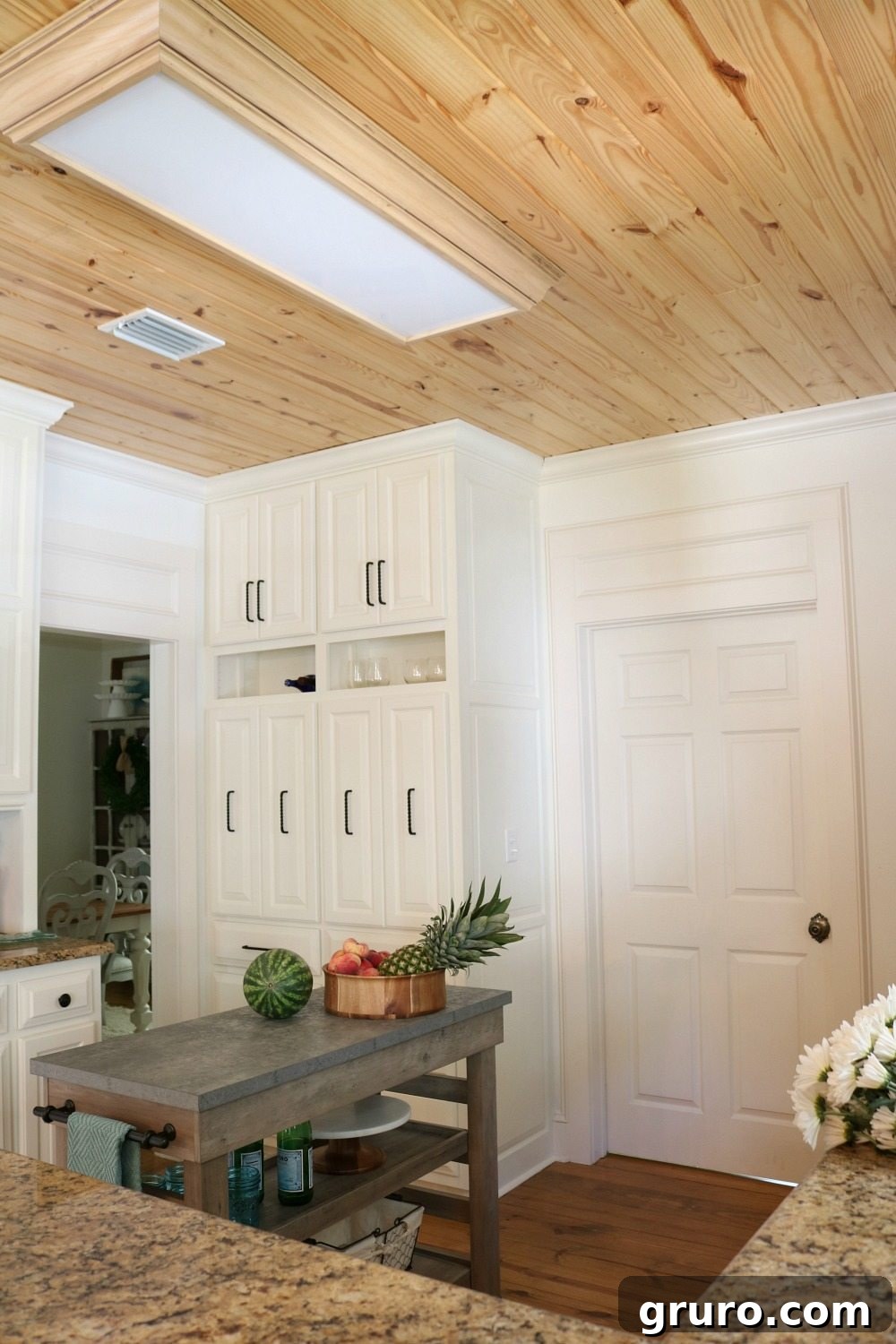 Great ceiling detail in the kitchen at Refresh Restyle showcasing natural wood