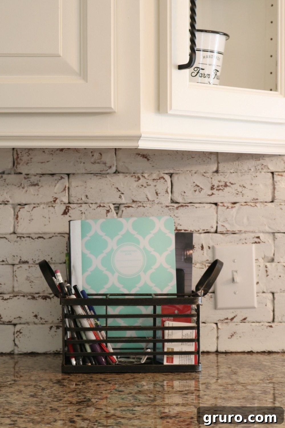 Kitchen items organized in a utensil holder keeping counters tidy