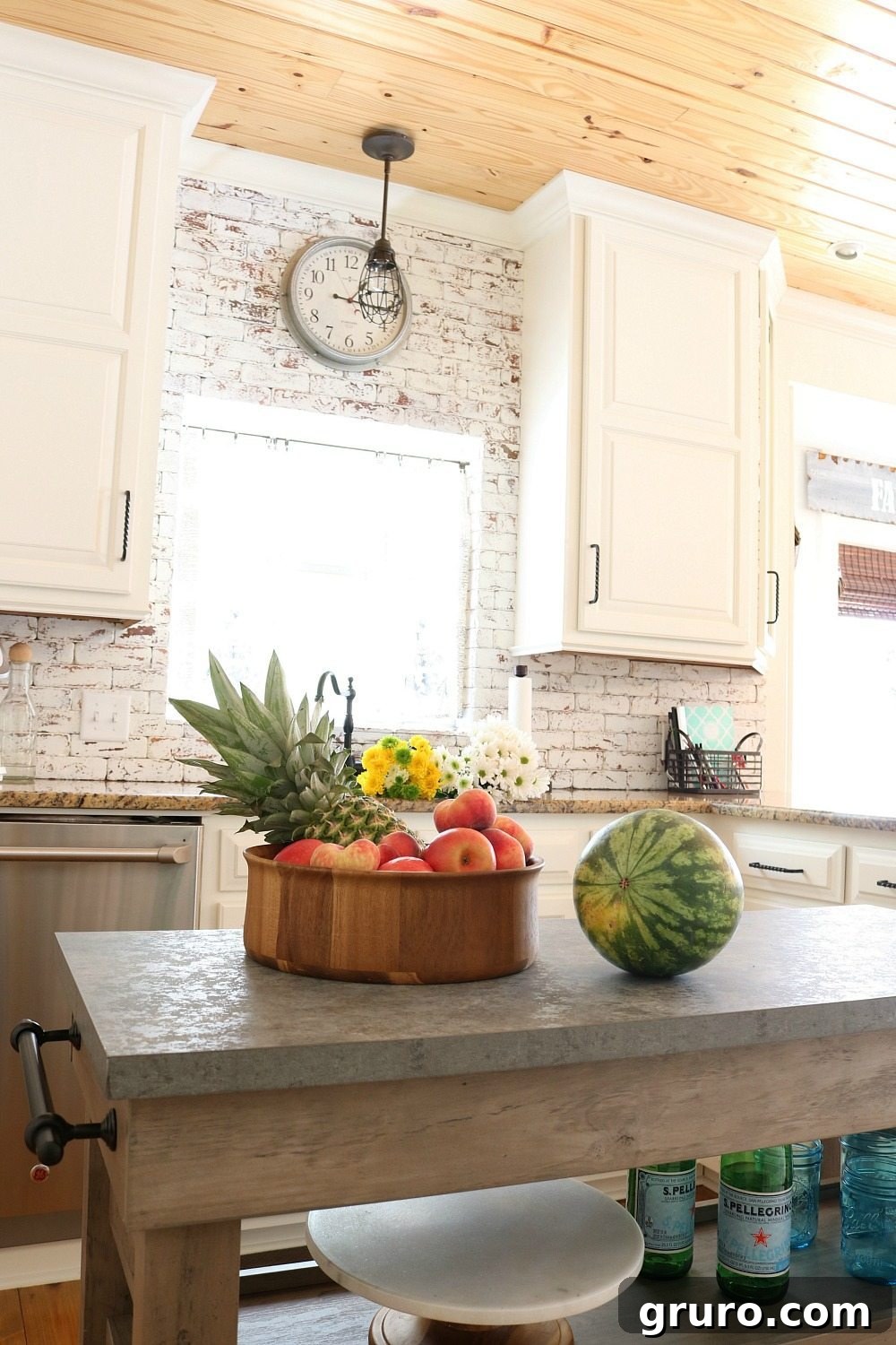 Farmhouse kitchen idea at Refresh Restyle showcasing fresh fruit and flowers