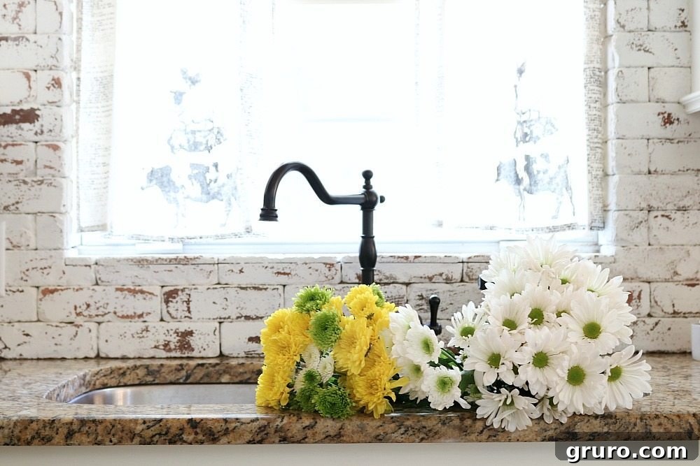 Painted brick backsplash at Refresh Restyle adding texture and character to the kitchen